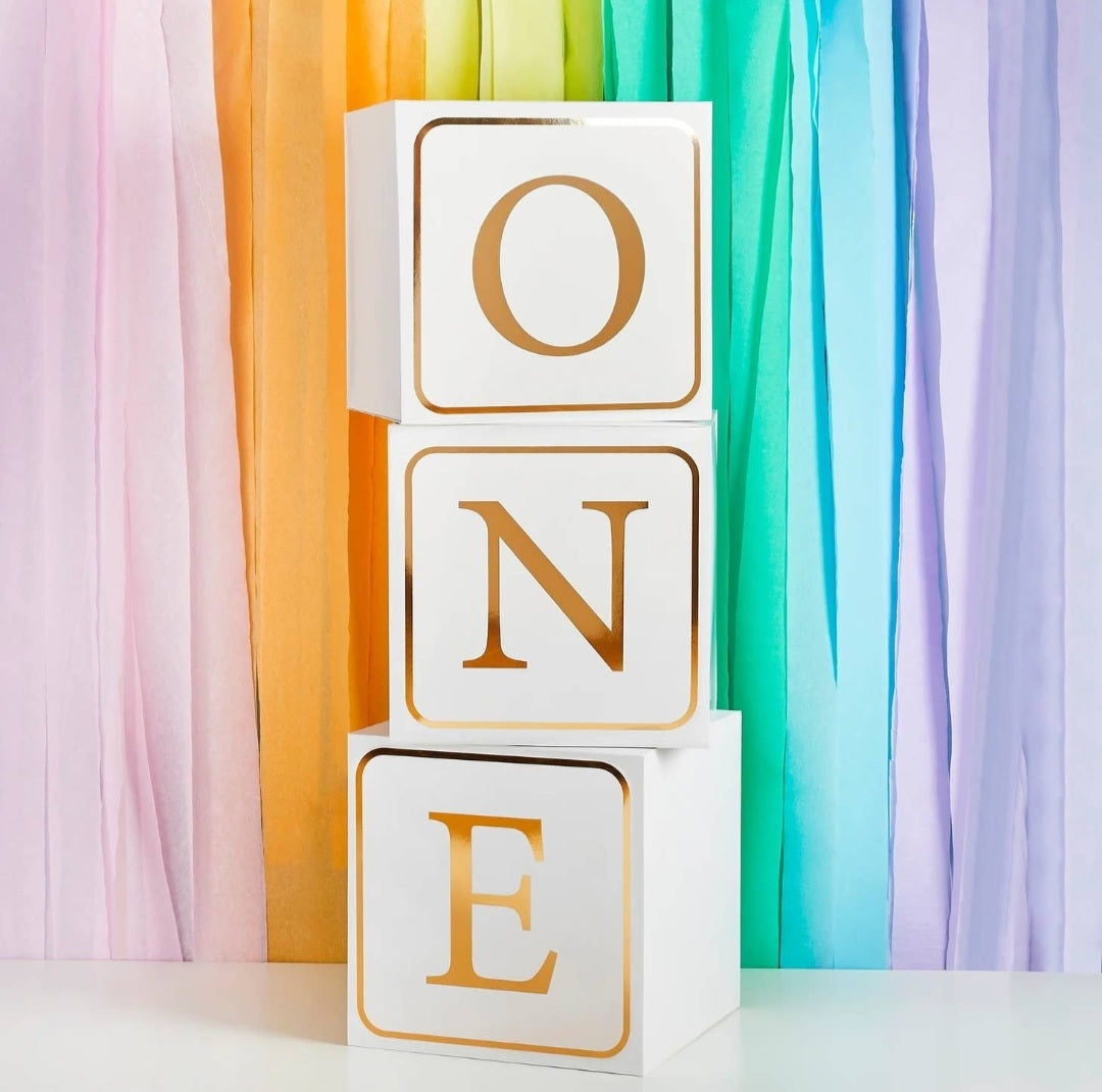 Gold "ONE" blocks